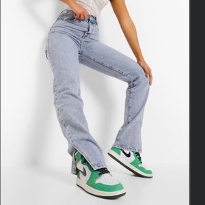 Brand new split hem jeans. Size L